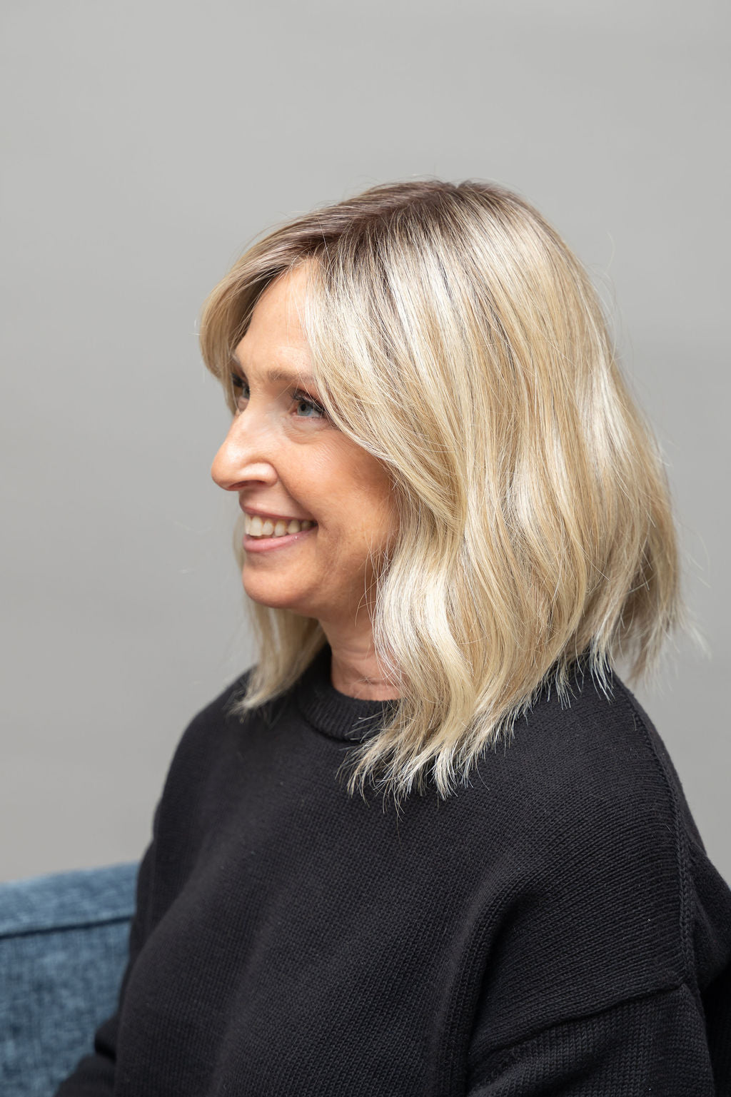 Frannie wearing Hollie in 22F16S8 Venice Blonde