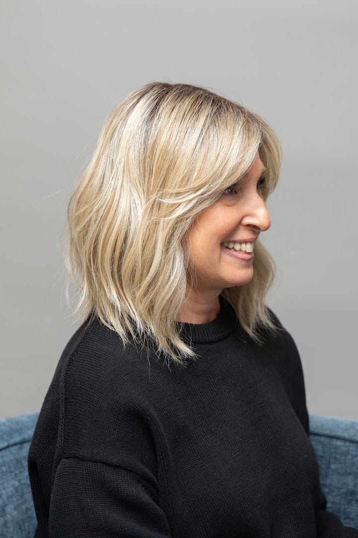 Frannie wearing Hollie in 22F16S8 Venice Blonde