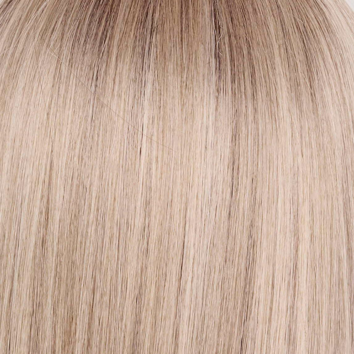 Billionaire Blond | A sophisticated hue featuring a rich mocha chocolate root that transitions into finely woven beige, ash, and cream blond tones. The face-framing luxurious cream and white blond highlights elevate the color, giving it an upscale, elegant appearance. This stunning blend exudes a high-end look that is both chic and refined.