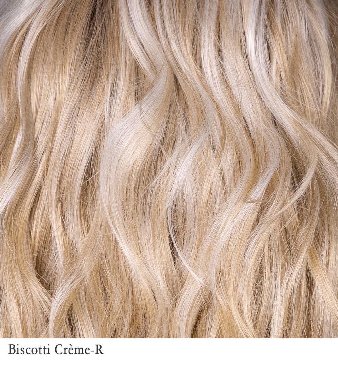 Biscotti Crème-R 24/101HS6 | Biscotti Crème Rooted is a soft, dimensional blonde shade that blends warm, golden-beige tones with light, creamy highlights for a sunlit, natural look. The “rooted” hair starts with a combination of medium brown, light brown, and dark blonde, natural-looking roots, before gradually transitioning into the warm and neutral biscotti base and creamy blonde accents. The overall effect is sophisticated, low-maintenance, and gives the illusion of natural hair growth.