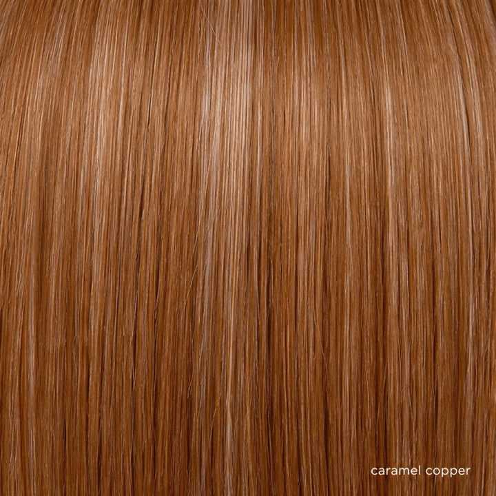 Caramel Copper | Caramel Copper is a radiant, one‑tone caramel copper shade enhanced with ultra‑fine cream blonde highlights to add definition and texture throughout. The delicate highlights are seamlessly blended, creating dimension and movement while maintaining a smooth, cohesive color story.