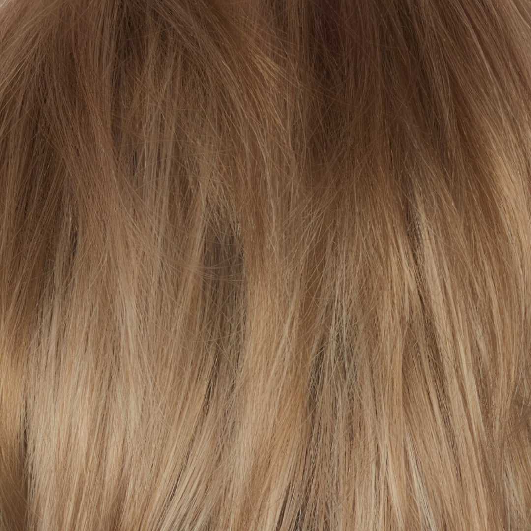Champagne Sunset-R | A luxurious dark/medium multi-tonal blond with a chocolate brown root regrowth that captures the essence of a summer sunset. This beautiful color is ideal for those who appreciate textured honey, ash and gold hues. Expertly woven tones provide an expensive, salon-inspired appearance that is both elegant and unique.