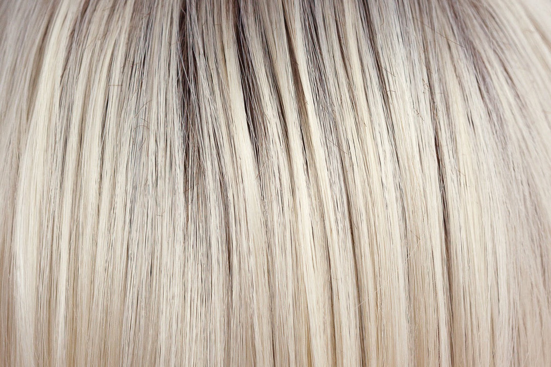 Coco Cream | A rich dark chocolate base that pushes the boundaries with its stunning displays of lily white chunky blond weaves and pale natural ash blond slices.