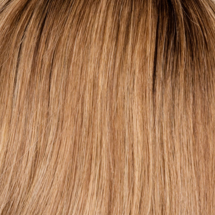 Highlighted Blond Root | Soft cool light blond and warm dark blond highlights. Soft light brown root tone creates a natural, modern vibe.