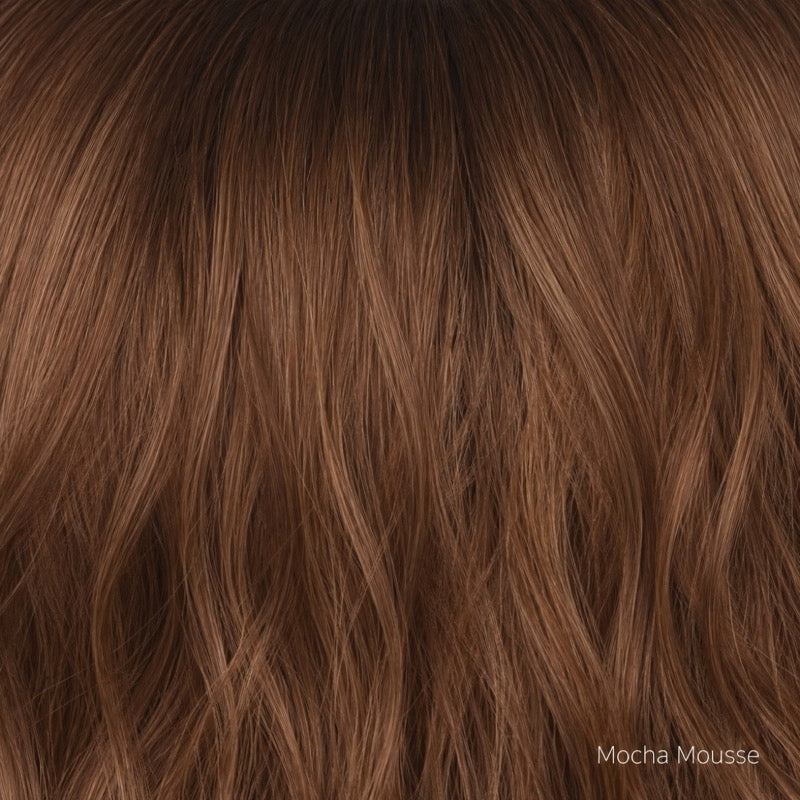 Mocha Mousse | Mocha Mousse is a beautifully rooted brunette featuring a rich mocha‑chocolate base layered with expertly blended highlights for natural depth and dimension. The soft, seamless root adds realism and contrast, enhancing the overall richness while allowing the lighter tones to flow effortlessly through the mid‑lengths and ends.