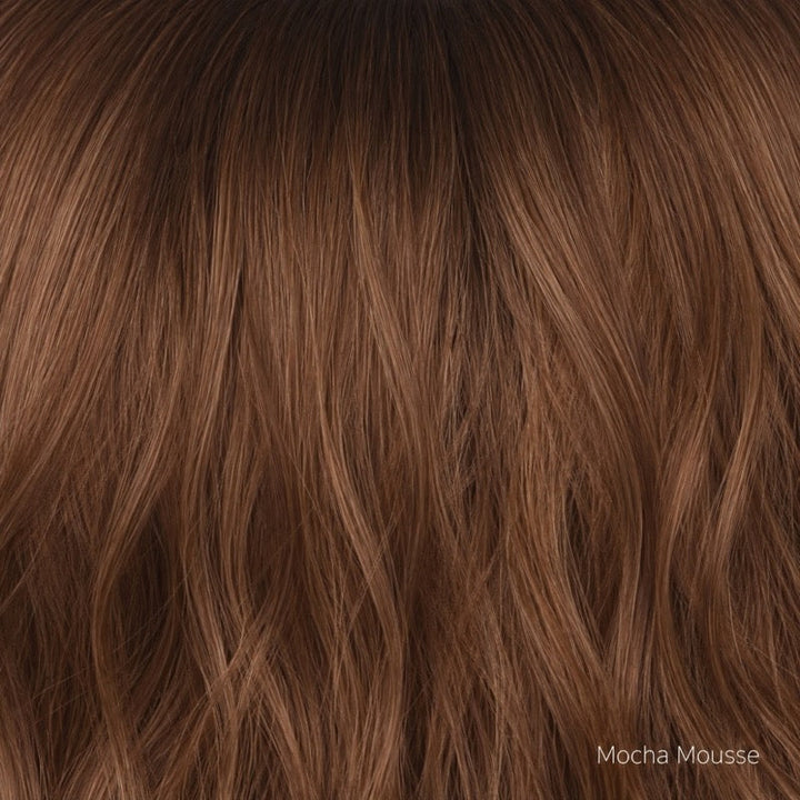 Mocha Mousse | Mocha Mousse is a beautifully rooted brunette featuring a rich mocha‑chocolate base layered with expertly blended highlights for natural depth and dimension. The soft, seamless root adds realism and contrast, enhancing the overall richness while allowing the lighter tones to flow effortlessly through the mid‑lengths and ends.