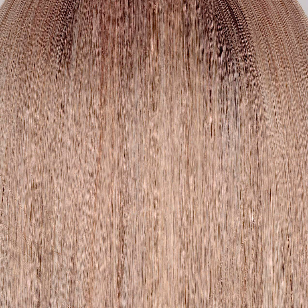 Mushroom Melange | Showcases a captivating mushroom blonde base accented by a mid-brown root. This intricate blend features multiple tones of mushroom, cream, and pale chocolate, seamlessly woven together for a rich and dynamic effect. The colors transition into softer mushroom shades and subtle steel blonde tones, creating a sophisticated gradient. This beautifully balanced combination offers a modern and stylish look that is both versatile and eye-catching.