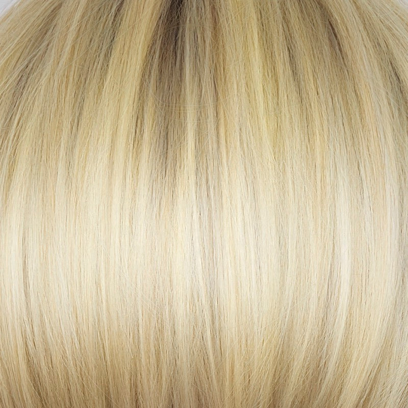 Light Ash Blond-R | This stunning cream ash blonde features natural-looking ash brown and white-grey roots that blend seamlessly into a variety of ash blonde tones. Woven with ash pearl blonde, creamy ivory, and pale creams, this fashion-forward shade delivers a sophisticated, multi-tonal finish for an elegant ash blonde look.