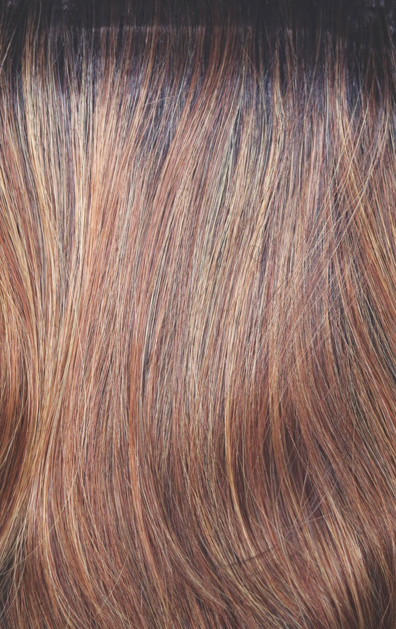 Shaded Amber | Dark auburn roots with a blend of dark copper and light copper highlights