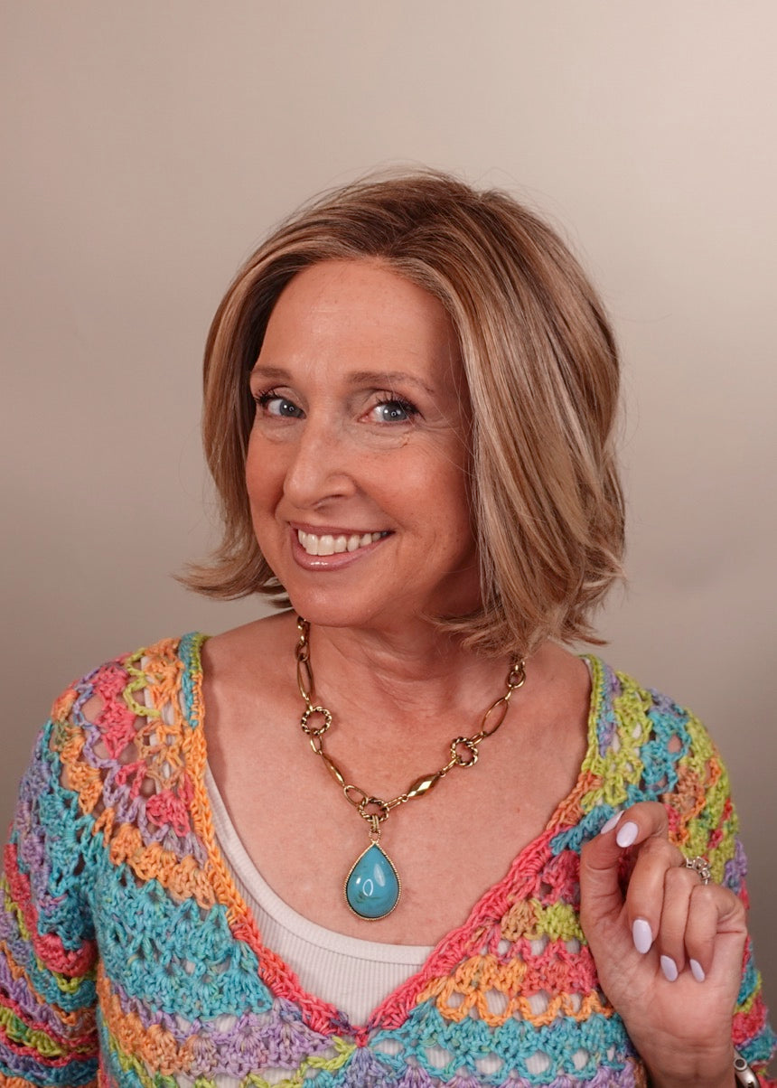 Frannie wearing Alicante in Macadamia Latte-R