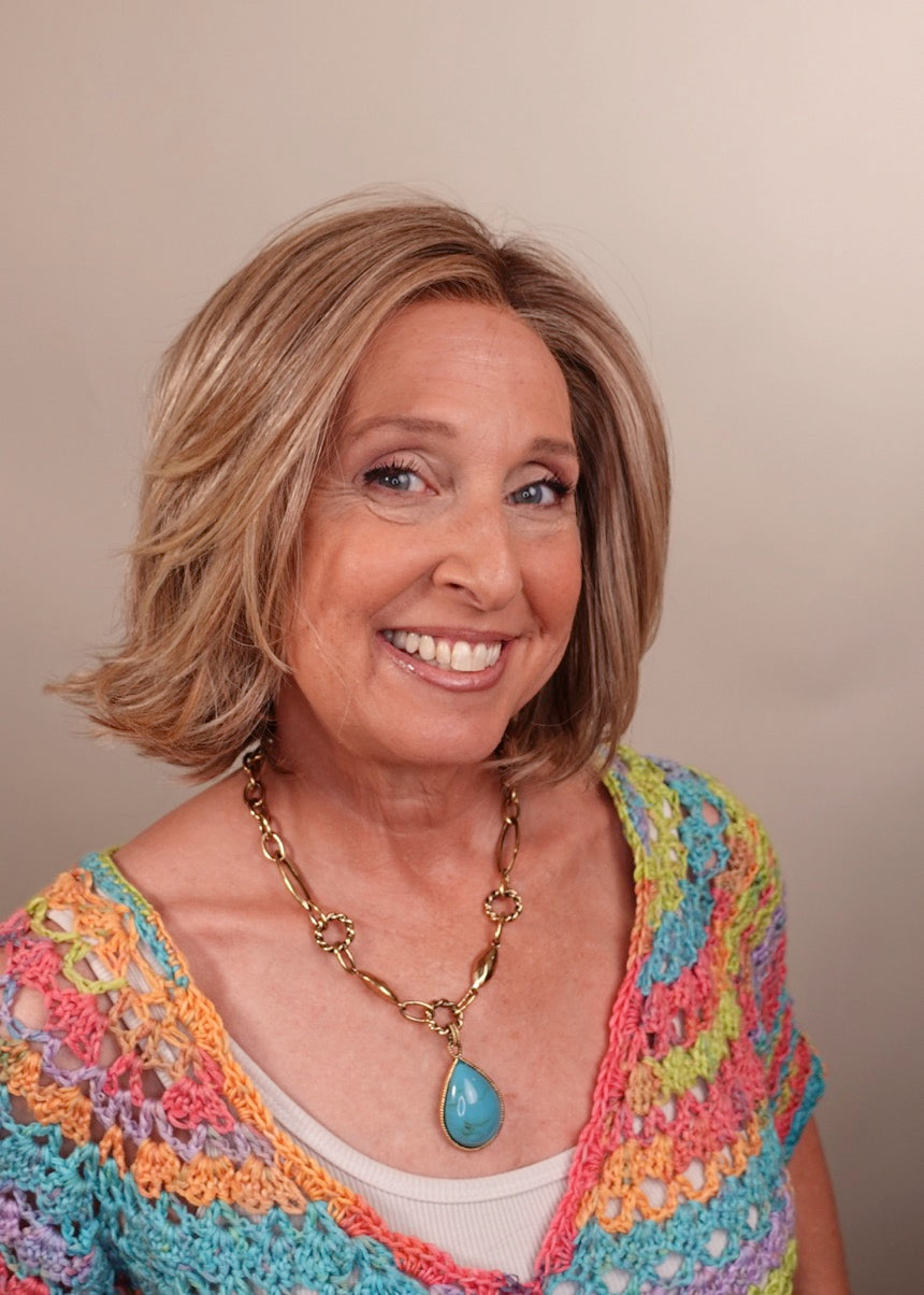 Frannie wearing Alicante in Macadamia Latte-R