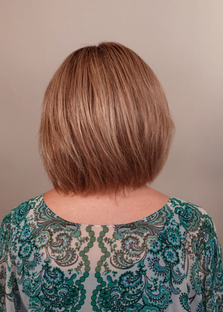 Frannie wearing Jadore Deluxe in Sand Multi Rooted