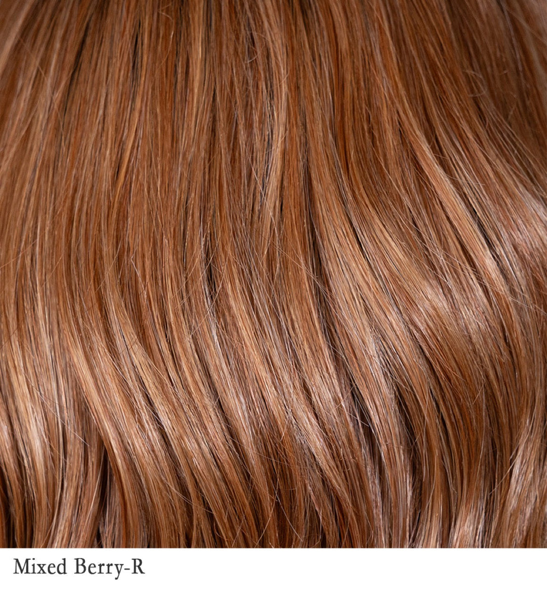 Mixed Berry-R 33/29+6 | A vibrant and modern red rooted for a natural regrowth effect. This shade combines deep red and auburn tones, creating a rich, multidimensional hue reminiscent of assorted berries. This dynamic blend offers a bold and sophisticated look, perfect for those seeking a striking yet natural appearance.
