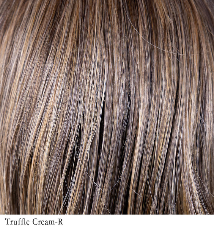 Truffle Cream-R 8/25+4 | A rich, medium brown base (akin to the color of a chocolate truffle) blended with creamy, light blonde highlights. The combination creates a harmonious balance between depth and lightness, resulting in a multidimensional brunette with subtle blonde accents. Rooted to create a natural, lived-in appearance.