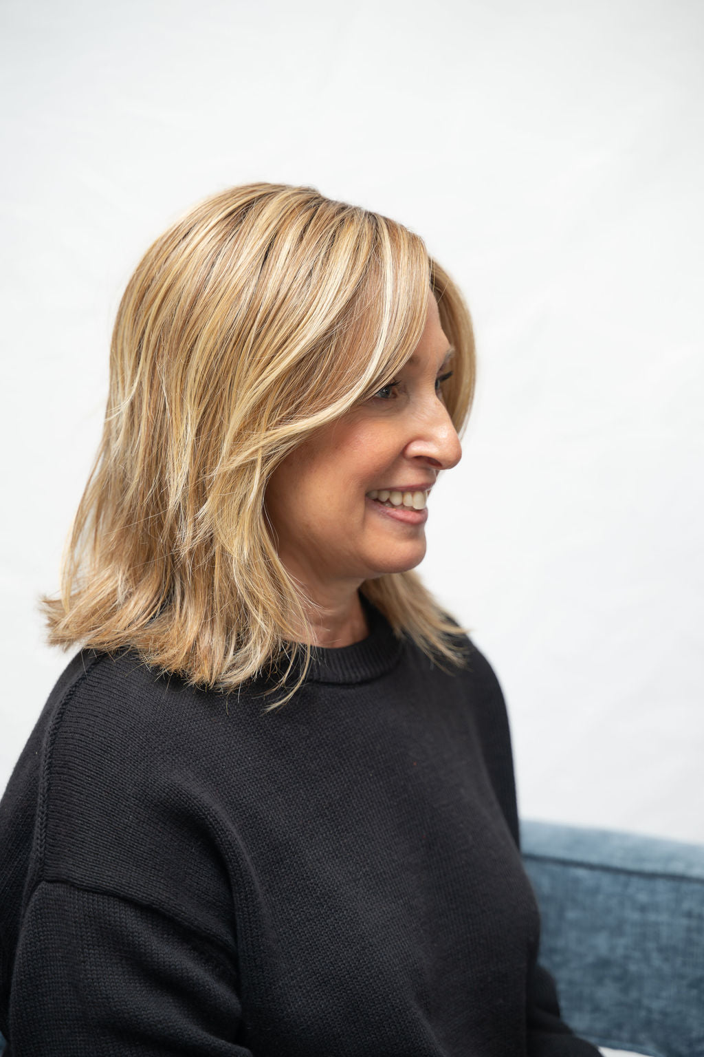 Frannie wearing Park Ave in Caramel Blonde-R