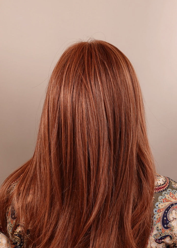 Frannie wearing Box Office Beauty in Rusty Auburn