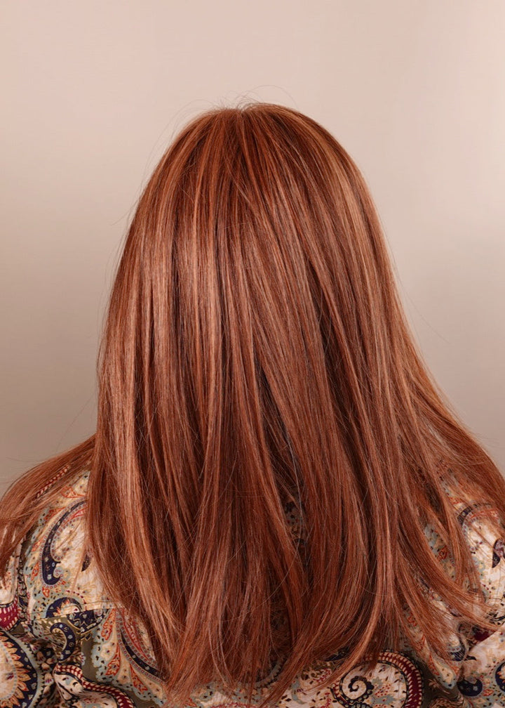 Frannie wearing Box Office Beauty in Rusty Auburn