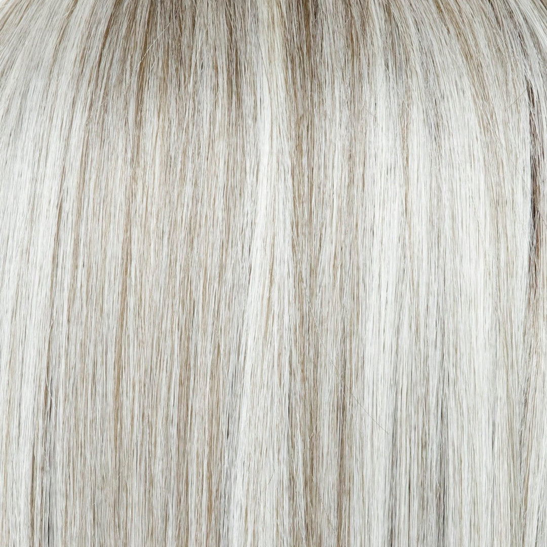 Slate Chocolate Split | Slate Chocolate Split is a beautiful hair color that combines a new grey tone with rich chocolate roots. The grey color is complimented by chunky chocolate, pale, and mid-gray highlights.